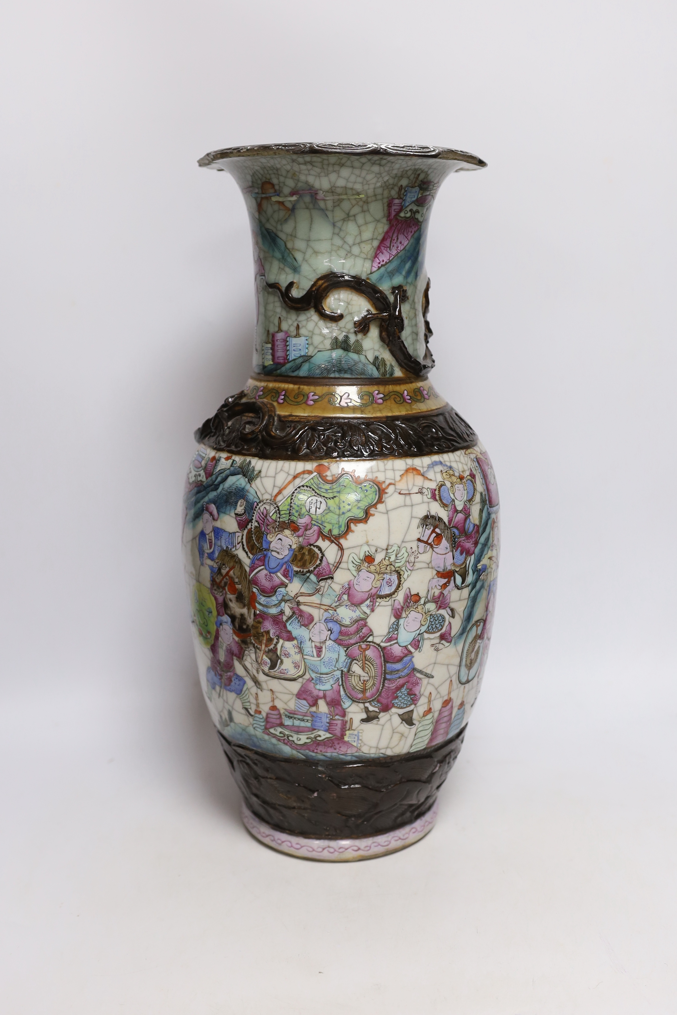 A Chinese famille rose crackle glaze 'warriors' vase, late 19th century, 46cm high, cracked